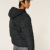 Mit Kunstfell gefütterte Daunenjacke