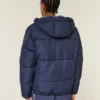 Mit Kunstfell gefütterte Daunenjacke