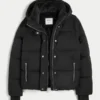 Mit Kunstfell gefütterte Daunenjacke Mit Kunstfell gefütterte Daunenjacke
