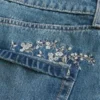 Mittlerer Waschgang Bestickter Denim-Minirock Mittlerer Waschgang Bestickter Denim-Minirock