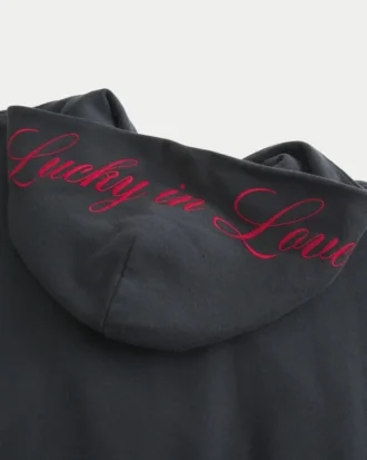 Oversized-Hoodie mit Reißverschluss und „Lucky in Love”-Grafik