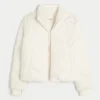 Pufferjacke mit Reißverschlussmuster