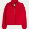 Pufferjacke mit Reißverschlussmuster