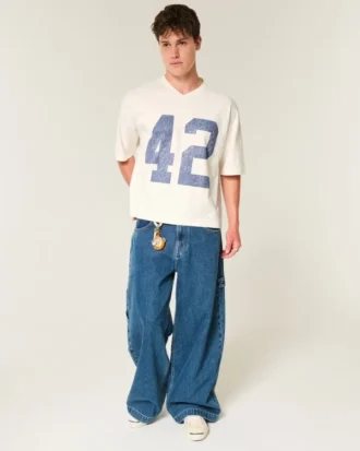 Schweres, baggy geschnittenes, kurzes Football-T-Shirt mit Grafikprint