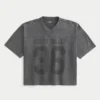 Schweres, baggy geschnittenes, kurzes Football-T-Shirt mit Grafikprint Schweres, baggy geschnittenes, kurzes Football-T-Shirt mit Grafikprint