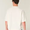 Schweres, baggy geschnittenes, kurzes Football-T-Shirt mit Grafikprint Schweres, baggy geschnittenes, kurzes Football-T-Shirt mit Grafikprint