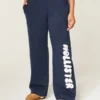 Sweathose mit Logo-Grafik und weitem Bein