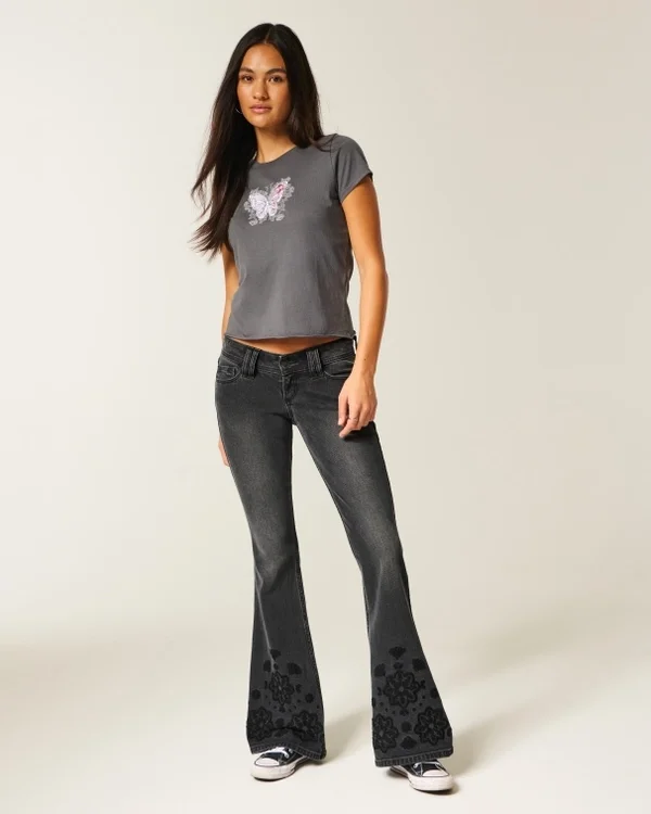 Ultra-Low-Rise-Jeans mit Blumenstickerei in gewaschenem Schwarz Ultra-Low-Rise-Jeans mit Blumenstickerei in gewaschenem Schwarz