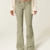 Ultra-niedrig geschnittene, bestickte Flare-Hose Ultra-niedrig geschnittene, bestickte Flare-Hose