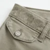 Ultra-niedrig geschnittene, bestickte Flare-Hose Ultra-niedrig geschnittene, bestickte Flare-Hose