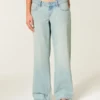 Ultra-niedrige Leibhöhe, hell gewaschen, Baggy-Jeans mit Schnallenverschluss hinten Ultra-niedrige Leibhöhe, hell gewaschen, Baggy-Jeans mit Schnallenverschluss hinten