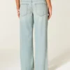 Ultra-niedrige Leibhöhe, hell gewaschen, Baggy-Jeans mit Schnallenverschluss hinten Ultra-niedrige Leibhöhe, hell gewaschen, Baggy-Jeans mit Schnallenverschluss hinten