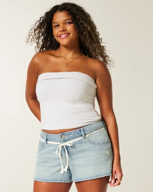 Ultra-niedrige Leibhöhe, hell gewaschene Denim-Mini-Shorts mit Spitzenband Ultra-niedrige Leibhöhe, hell gewaschene Denim-Mini-Shorts mit Spitzenband
