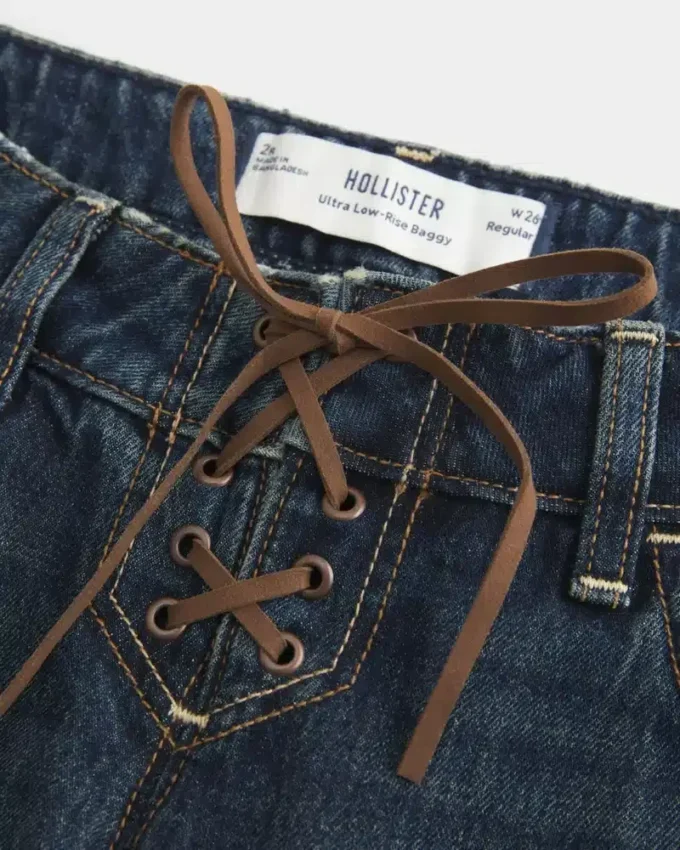 Ultra-niedrige Passform, dunkel gewaschene Baggy-Jeans mit Schnürung Ultra-niedrige Passform, dunkel gewaschene Baggy-Jeans mit Schnürung