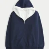 Wendbarer Hoodie mit Kunstfellfutter und Reißverschluss Wendbarer Hoodie mit Kunstfellfutter und Reißverschluss