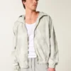 Windjacke mit Reißverschluss und Camouflage-Muster Windjacke mit Reißverschluss und Camouflage-Muster